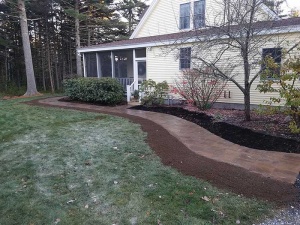 Walkway and landscaping by Lawns in Order Blue Hill Maine